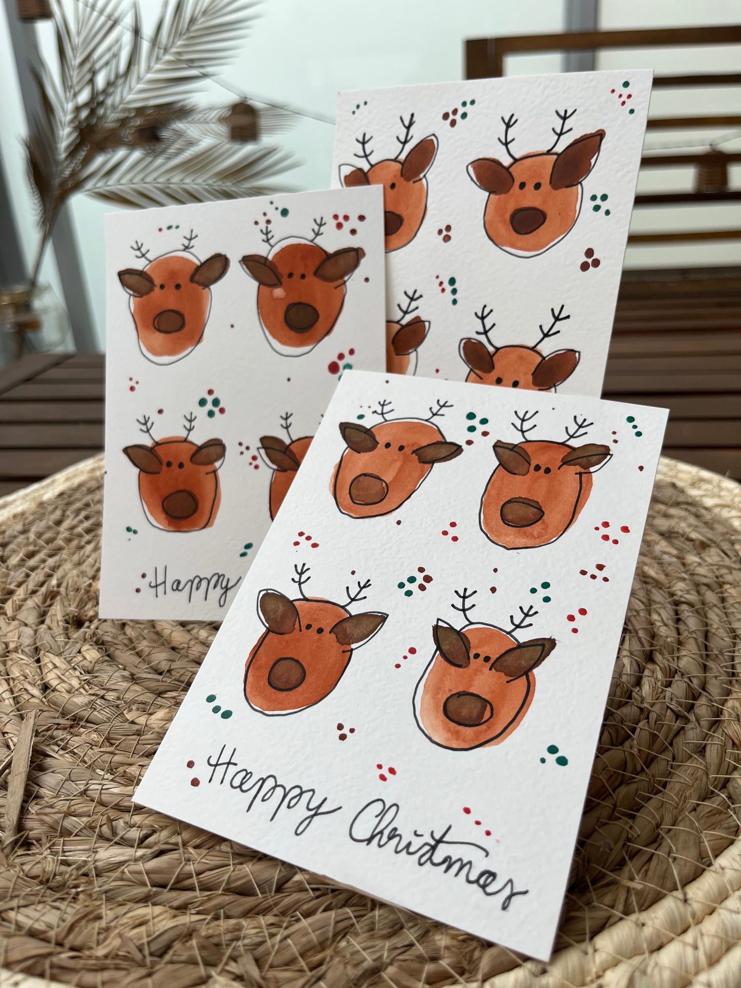 Handgemachte Weihnachtskarte mit Rentieren