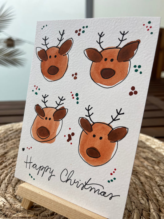 Handgemachte Weihnachtskarte mit Rentieren