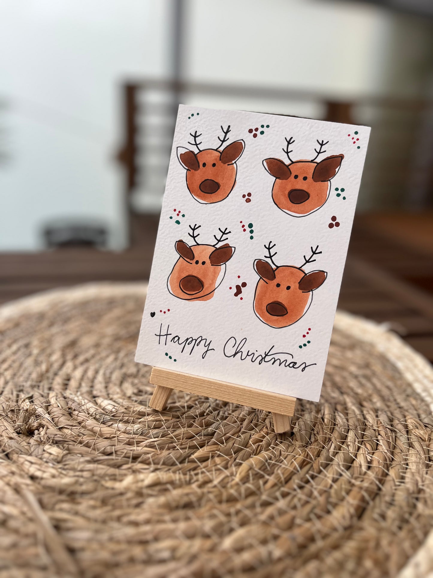 Handgemachte Weihnachtskarte mit Rentieren